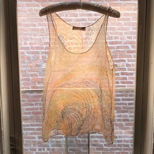 Beautiful sheer top.